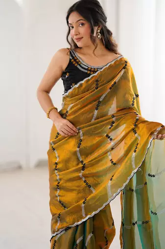 Gold color fendy satin beautiful rich feel ceremonial looks saree