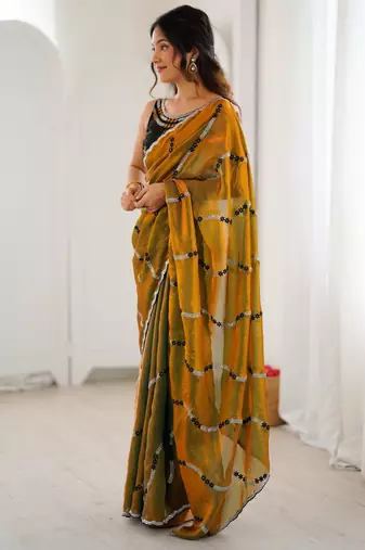Gold color fendy satin beautiful rich feel ceremonial looks saree