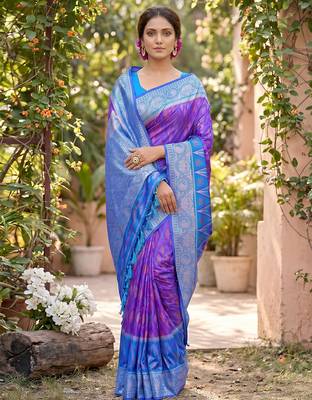 Purple color soft silk fabric woven designer ethnic partywear saree 1