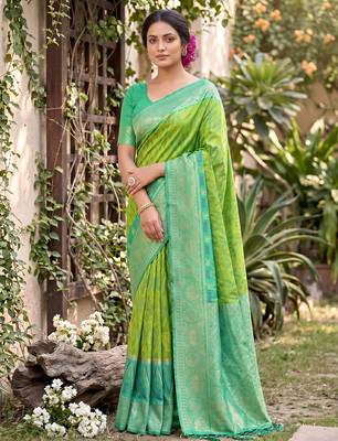 Parrot green color soft silk fabric woven designer ethnic partywear saree 1