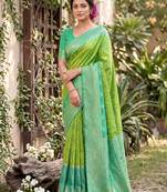 Parrot green color soft silk fabric woven designer ethnic partywear saree