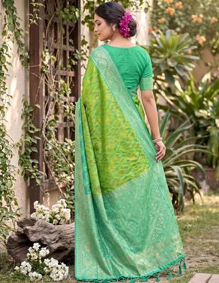 Parrot green color soft silk fabric woven designer ethnic partywear saree 2
