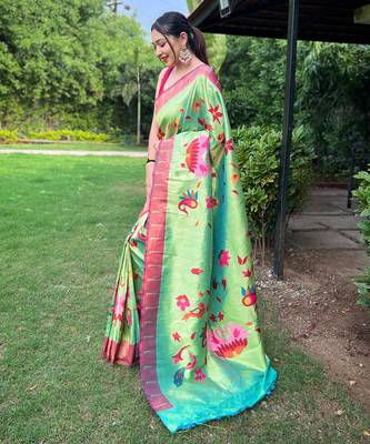 Traditional lemon green silk blend saree with vibrant floral motifs 2
