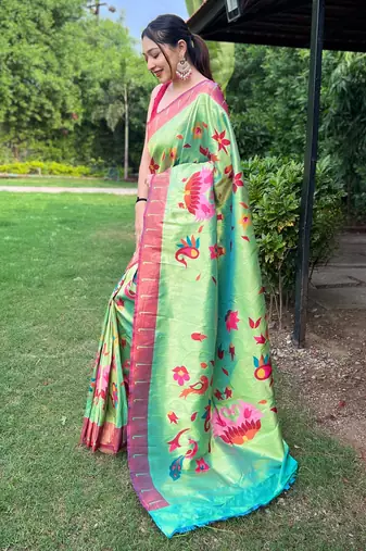 Traditional lemon green silk blend saree with vibrant floral motifs
