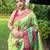 Traditional lemon green silk blend saree with vibrant floral motifs