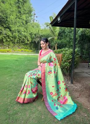 Traditional lemon green silk blend saree with vibrant floral motifs 4