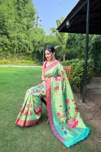Traditional lemon green silk blend saree with vibrant floral motifs