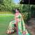 Traditional lemon green silk blend saree with vibrant floral motifs