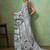 Grey color beautiful printed georgette fabric saree with sparkle work