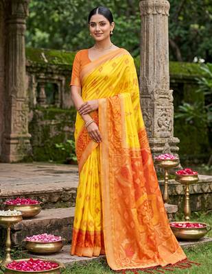 Yellow color soft silk fabric woven designer partywear saree 1