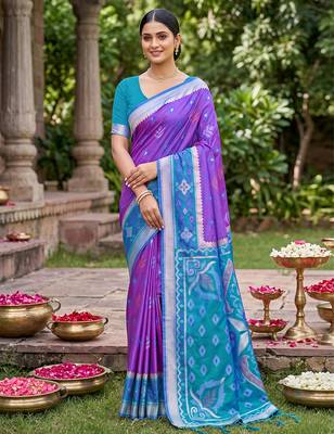 Purple color soft silk fabric woven designer partywear saree 1