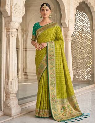 Green color banarasi silk fabric graceful ethnic woven saree 1