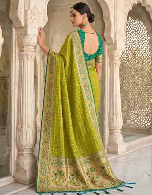 Green color banarasi silk fabric graceful ethnic woven saree 2