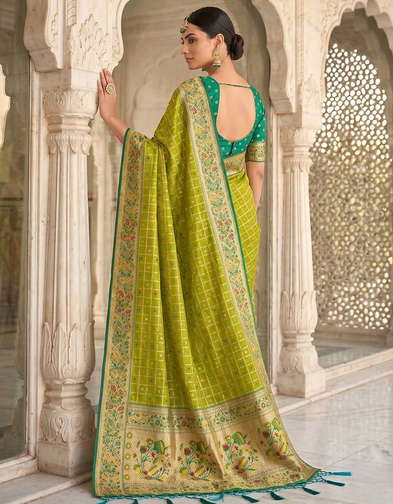 Green color banarasi silk fabric graceful ethnic woven saree