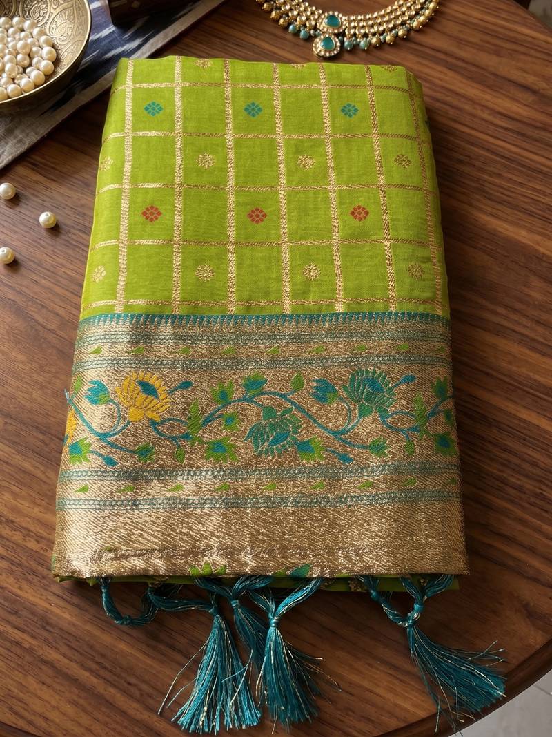 Green color banarasi silk fabric graceful ethnic woven saree
