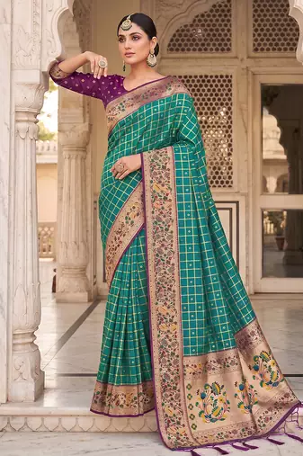 Rama color banarasi silk fabric graceful ethnic woven saree