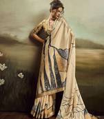 Beige color jacquard silk fabric fabric beautiful floral print saree