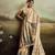 Beige color jacquard silk fabric fabric beautiful floral print saree