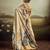 Beige color jacquard silk fabric fabric beautiful floral print saree
