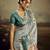 Aqua green color jacquard silk fabric fabric beautiful floral print saree
