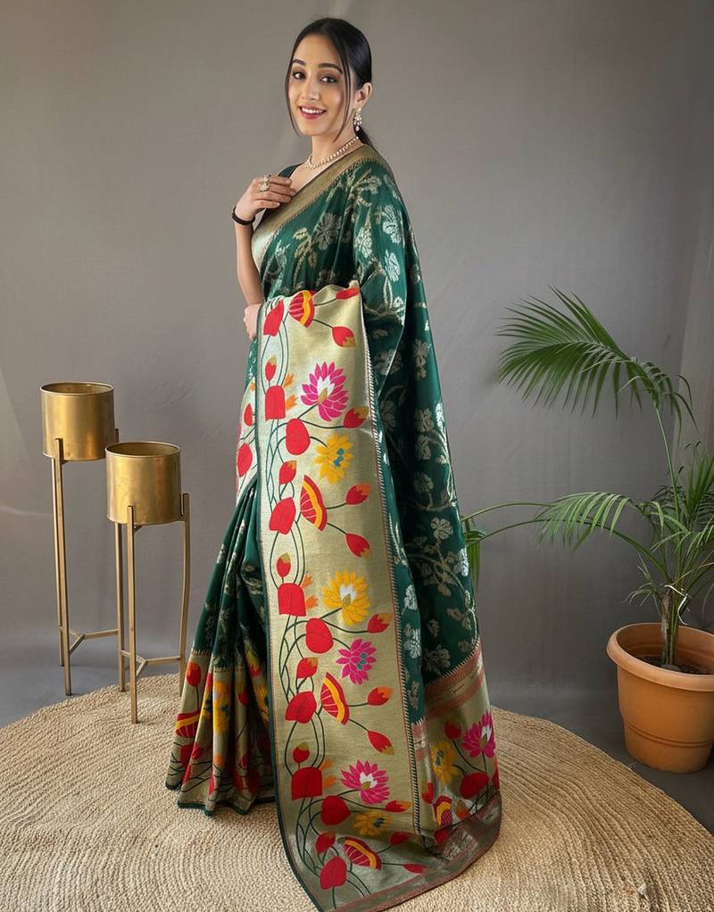 Green silk blend saree with rich weaved heavy pallu & 3d traditional design with gold and silver zari