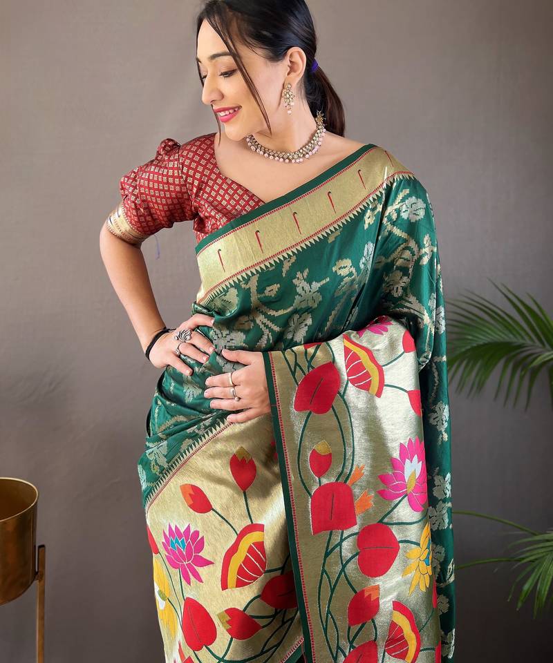 Green silk blend saree with rich weaved heavy pallu & 3d traditional design with gold and silver zari