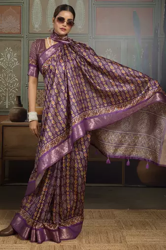 Purple color beautiful ethnic partywear saree for traditional rich looks