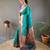 Rama green color silk blend saree with rich contrast weaving pallu & border and beautiful buttis
