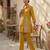 Riwomen's yellow ethnic motif embroidered tunic with straight fit trousers