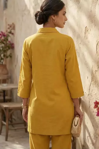 Riwomen's yellow ethnic motif embroidered tunic with straight fit trousers