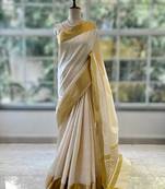 Cream art silk woven saree with hand print