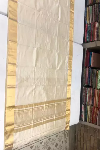 Cream art silk woven saree with hand print