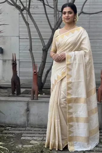 Cream art silk woven saree with hand print