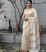 Cream art silk woven saree with hand print