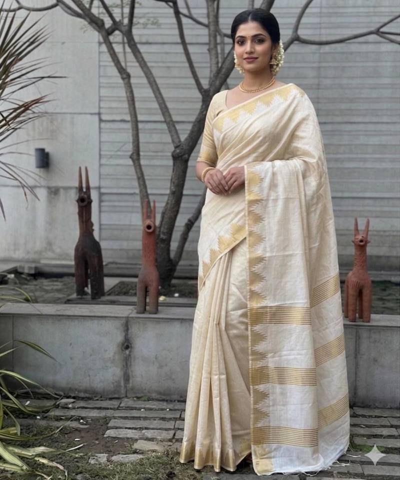 Cream art silk woven saree with hand print