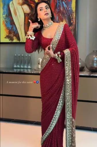 Red georgette embroidered saree with sequins work