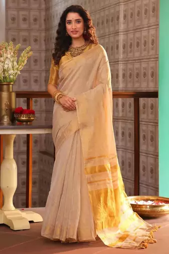 Cream art silk woven saree with zari work