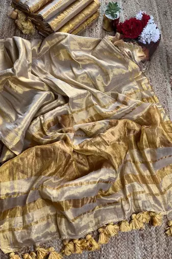 Cream art silk woven saree with zari work