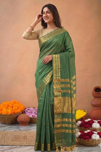 Green art silk woven saree with zari work