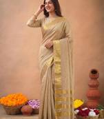 Beige art silk woven saree with zari work
