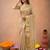 Beige art silk woven saree with zari work