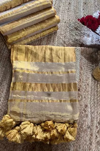 Beige art silk woven saree with zari work
