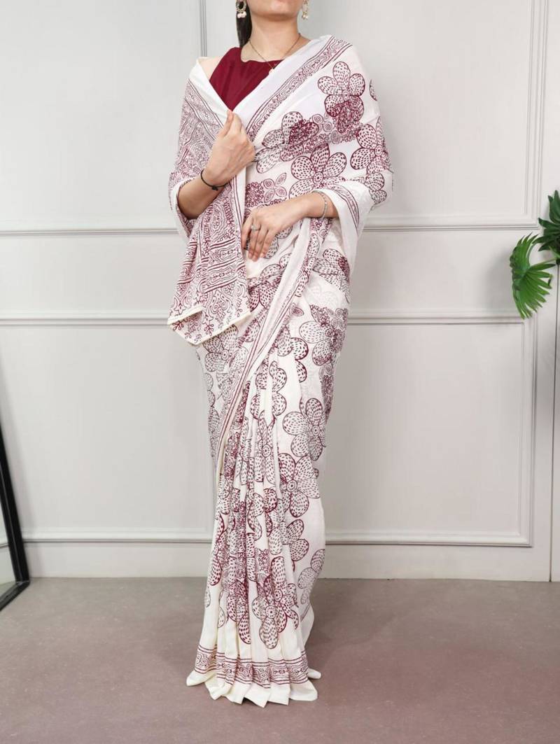 White fabric of saree printed saree with floral print