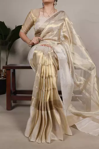 Beige tissue woven saree with zari work