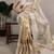 Beige tissue woven saree with zari work