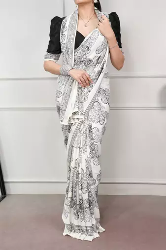 White fabric of saree printed saree with floral print