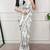 White fabric of saree printed saree with floral print