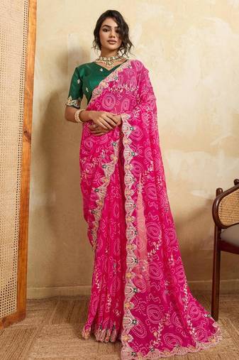 Pink georgette printed saree with zari work