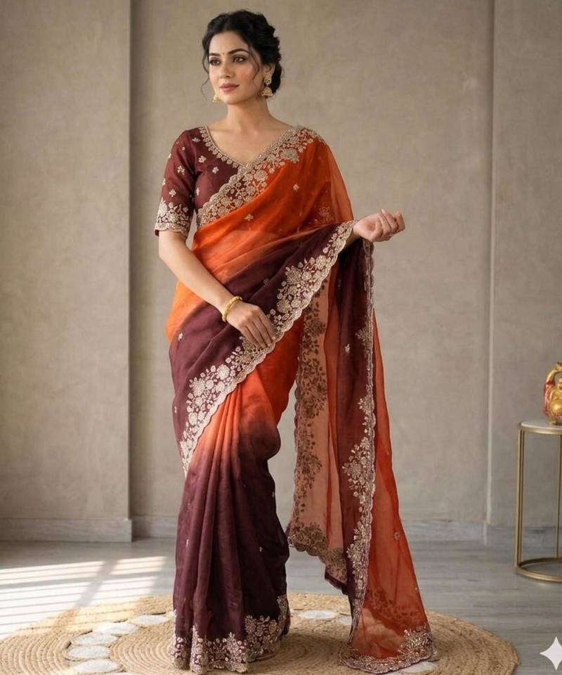 Orange silk blend embroidered saree with sequins work