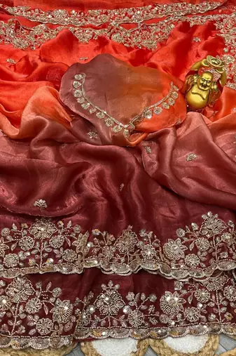 Orange silk blend embroidered saree with sequins work